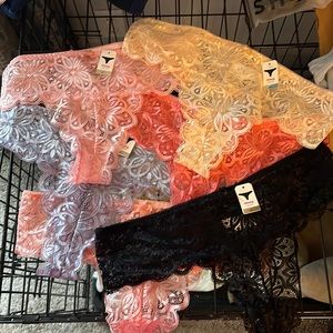 Lot of six lace thong panties, size XL. New with tags.